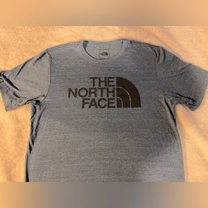 The North Face tee shirt. NEVER WORN. Size large.